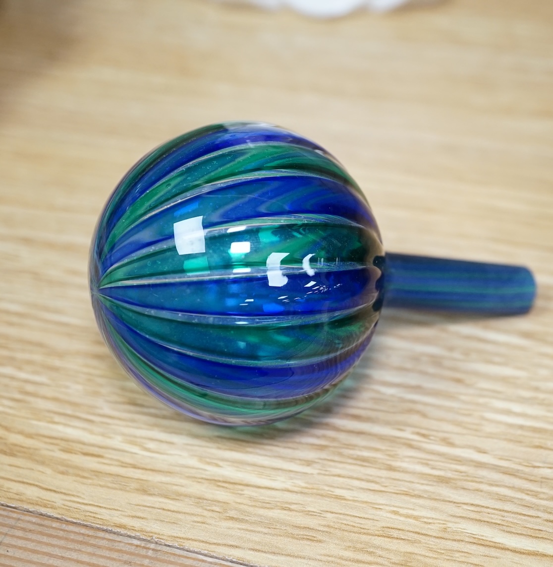 A Murano cane art glass decanter and stopper by Orlando Zennaro, signed to the base, 17cm high. Condition - good
